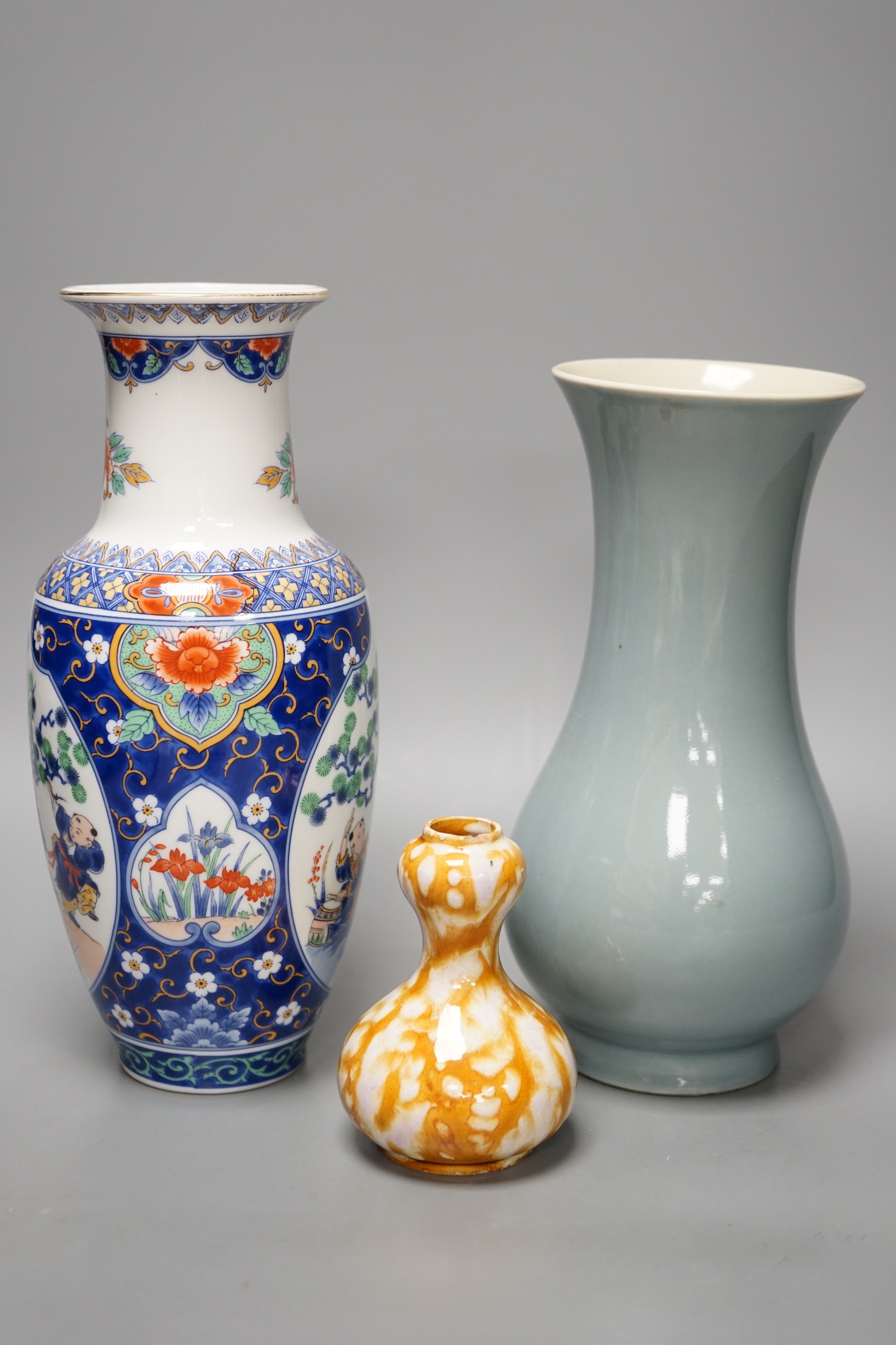 A Chinese Clair De Lune glazed baluster vase and two other Chinese vases. Tallest 26.5cm